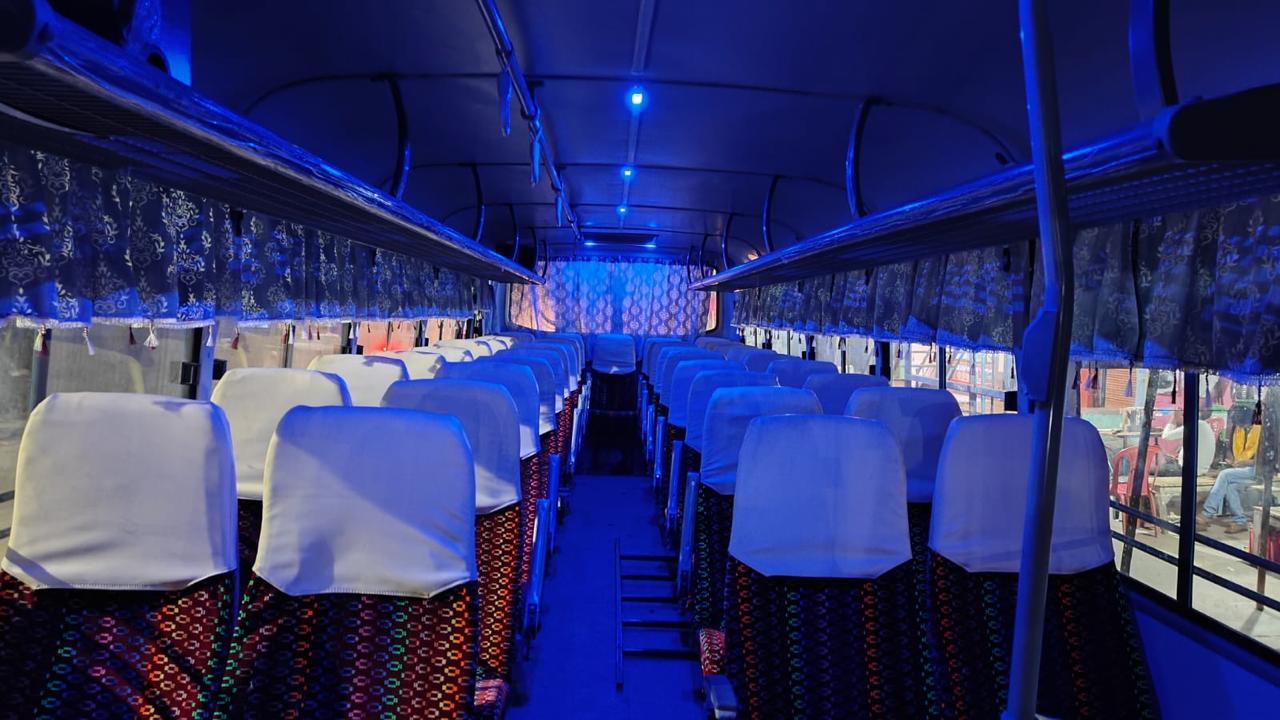 Interior seating under ambient blue lighting