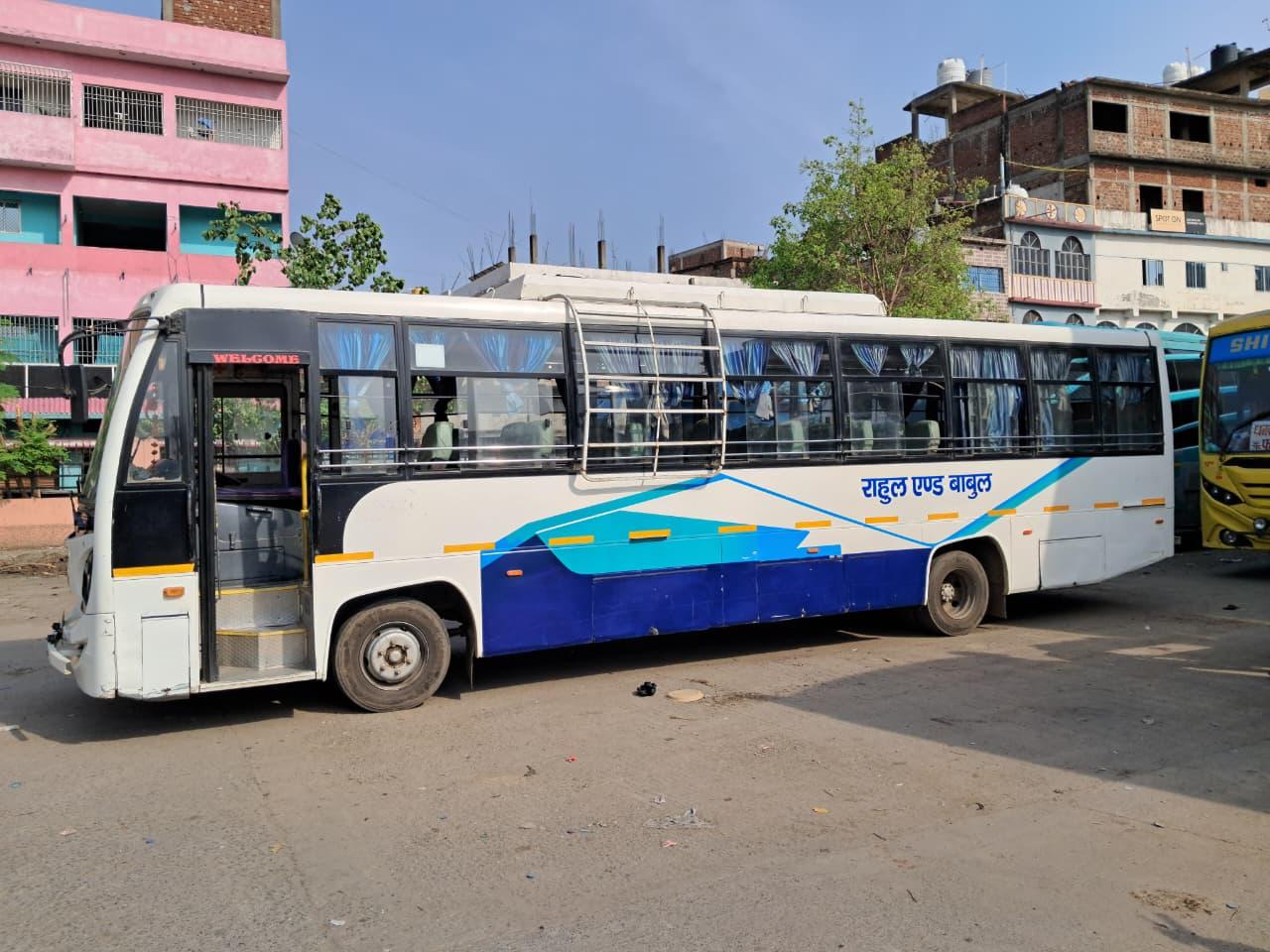 Bus parked at yard, angled side view